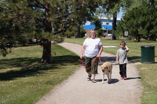 Andi Halvorsen with her son and a dog